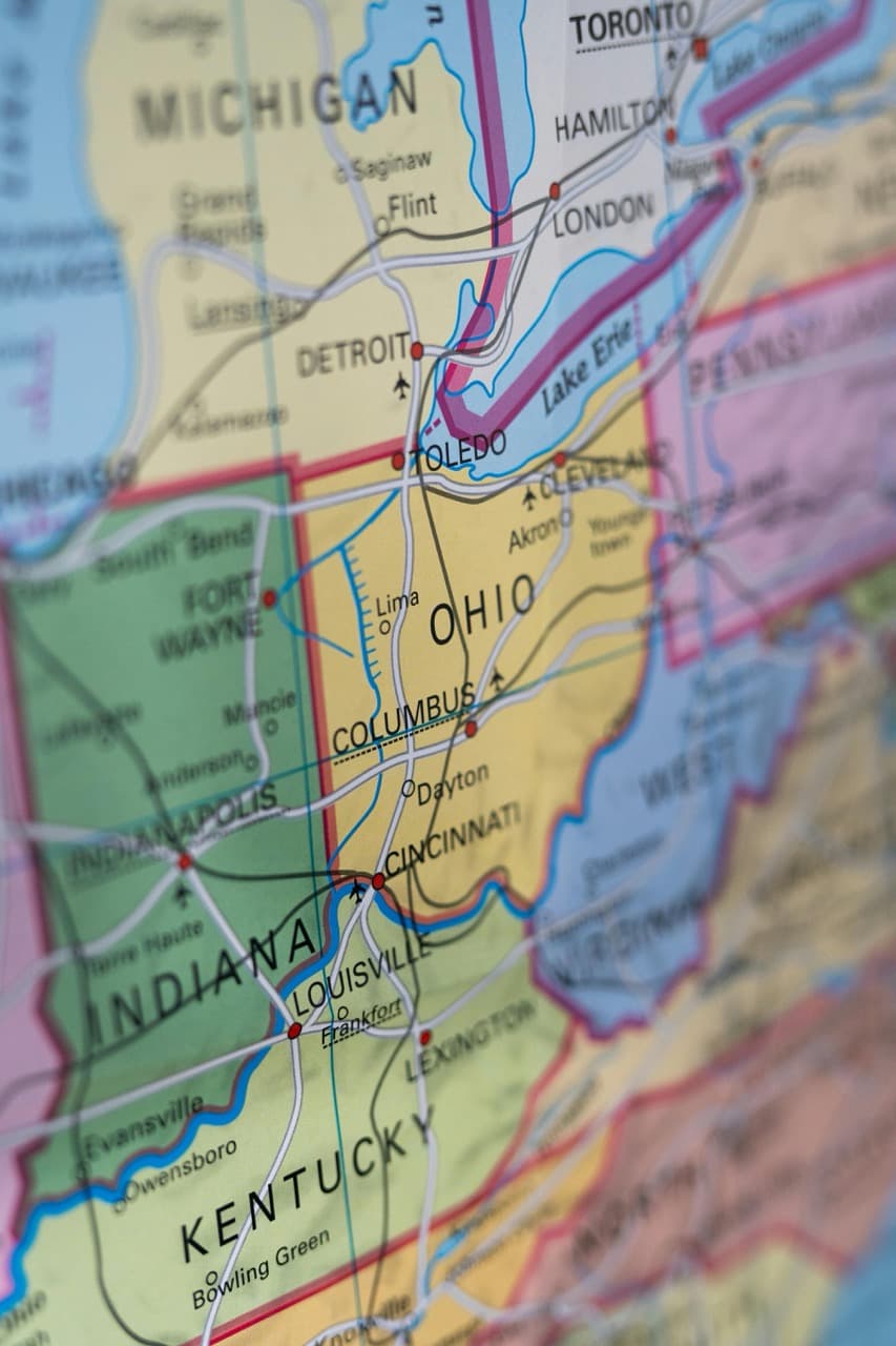 A paper map of the state of United States Mid-West, focusing on Ohio